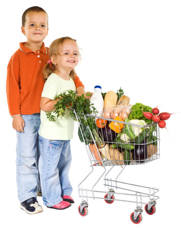photo of children pushing a shopping cart filled with healthy food